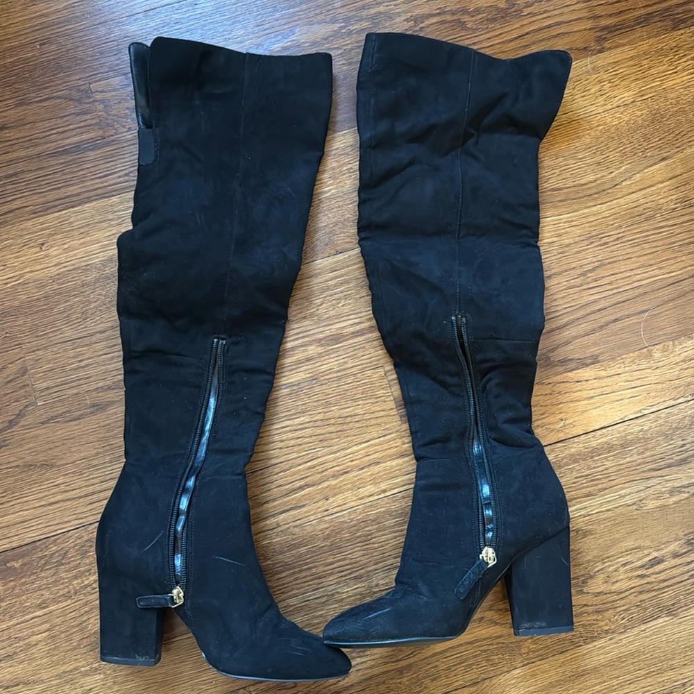 Gently worn knee high black boots